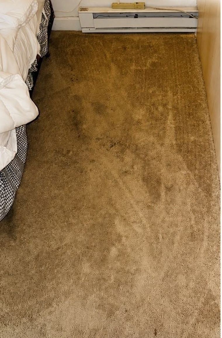 Bedroom carpet in a Hudson MA home before cleaning, showing dark traffic-lane soil
